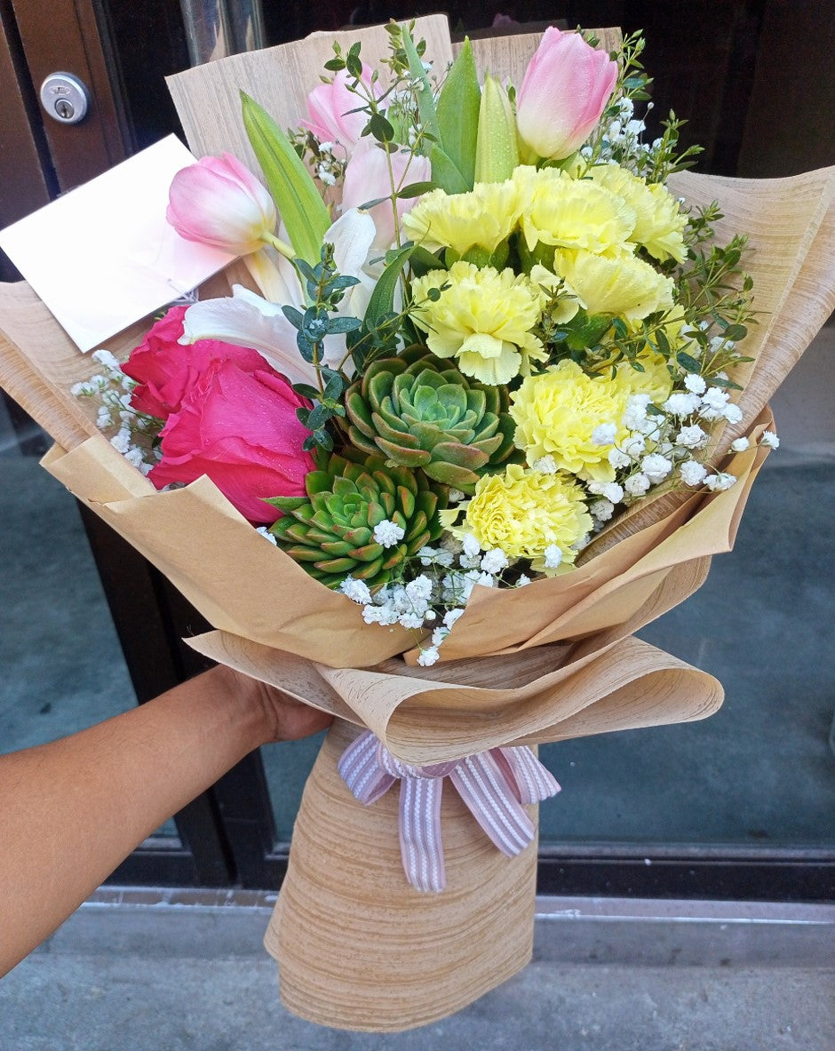 3 Tulips, 2 Pink Ecuadorian Roses, 10 Yellow Carnation & 1 Stargazer Bouquet BO – 08